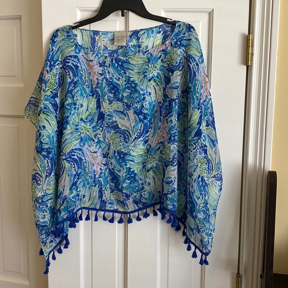 Charlie Paige top.  Throw over your head lightweight cape/dress us summer outfit